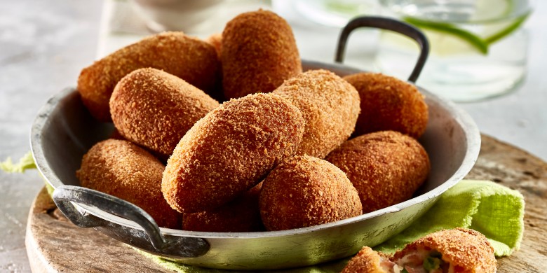 Beenhamkroketjes met doperwtjes