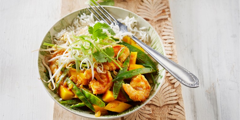 Gele curry met mango en garnalen
