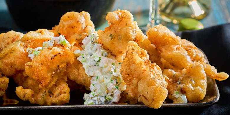 Gefrituurde kabeljauw met sinaasappelravigote