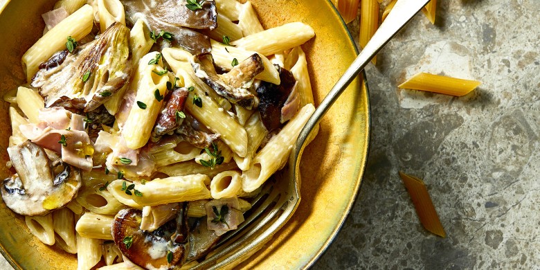 Penne met romige paddenstoelensaus en ham 