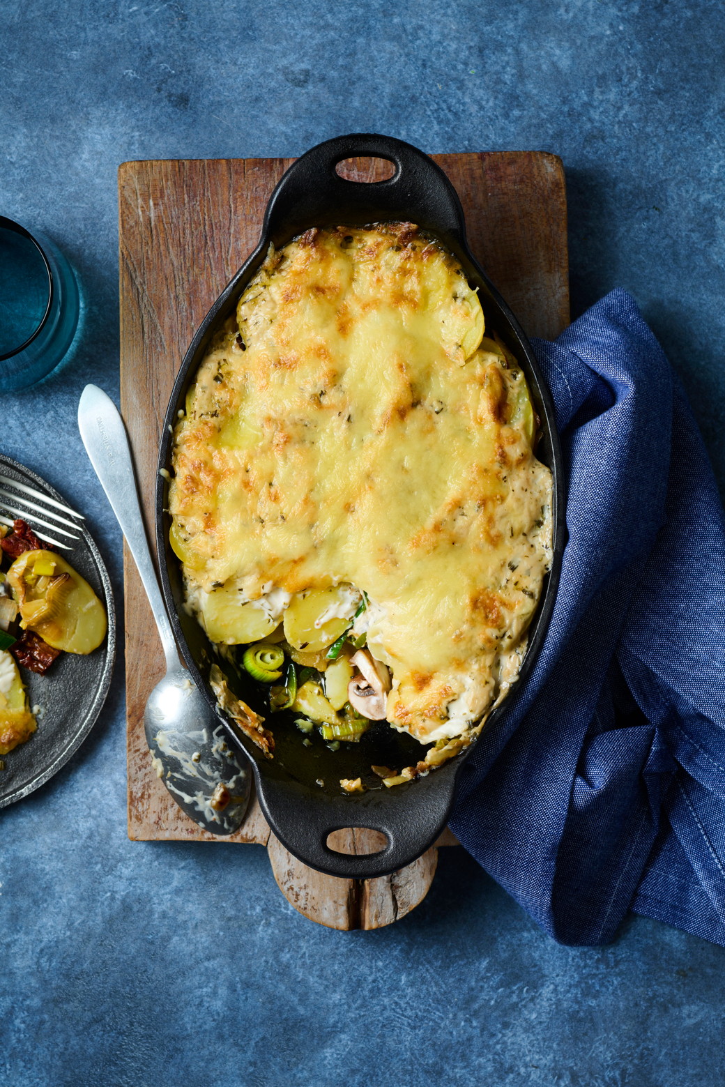 Aardappelgratin met prei en kastanjechampignons