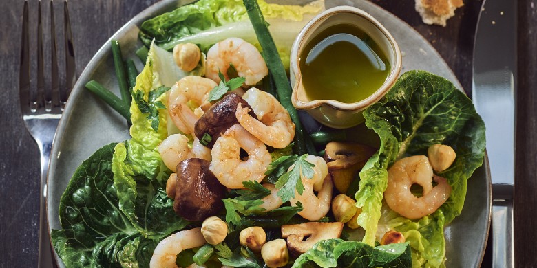 Warme garnalensalade met haricots verts en champignons