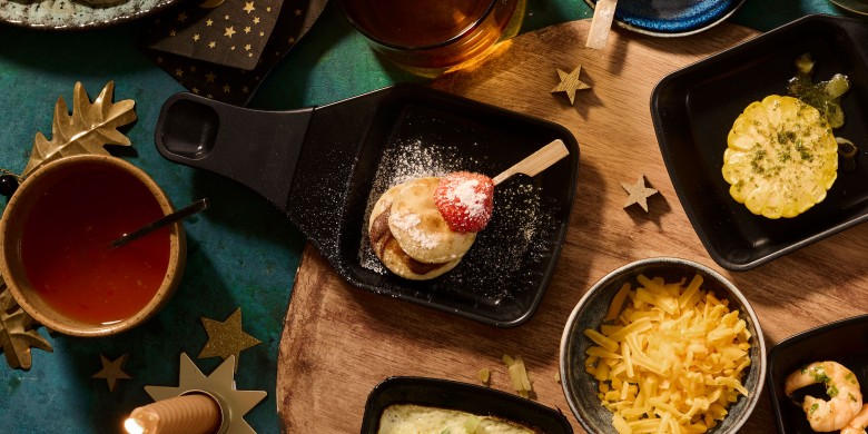 Poffertjes met hazelnootpasta en aardbei