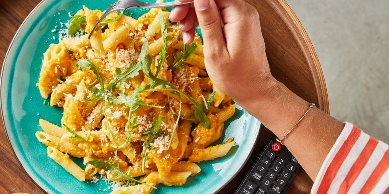Penne met pompoenpesto en rucola