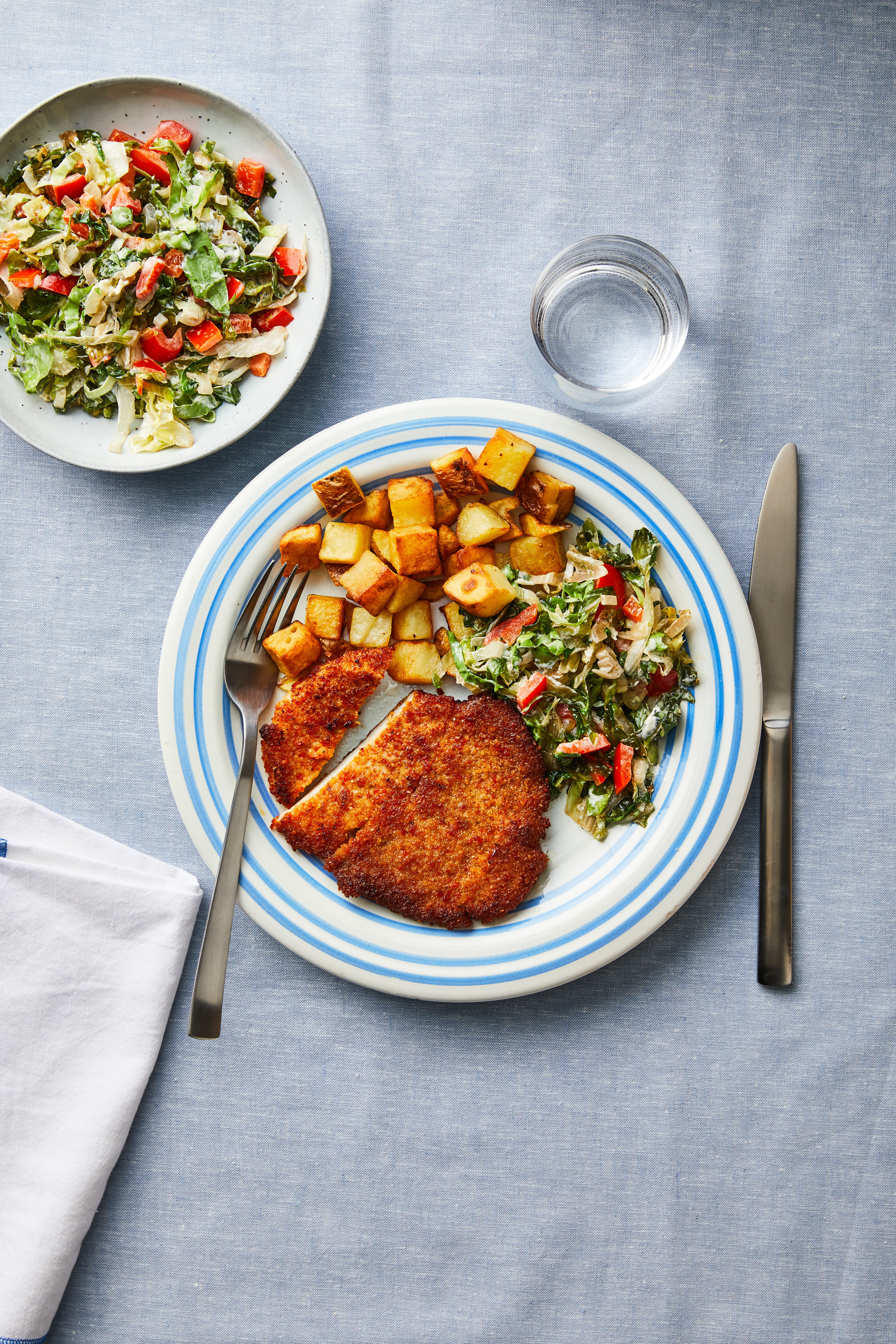 Schnitzel met roomandijvie en opbakkertjes