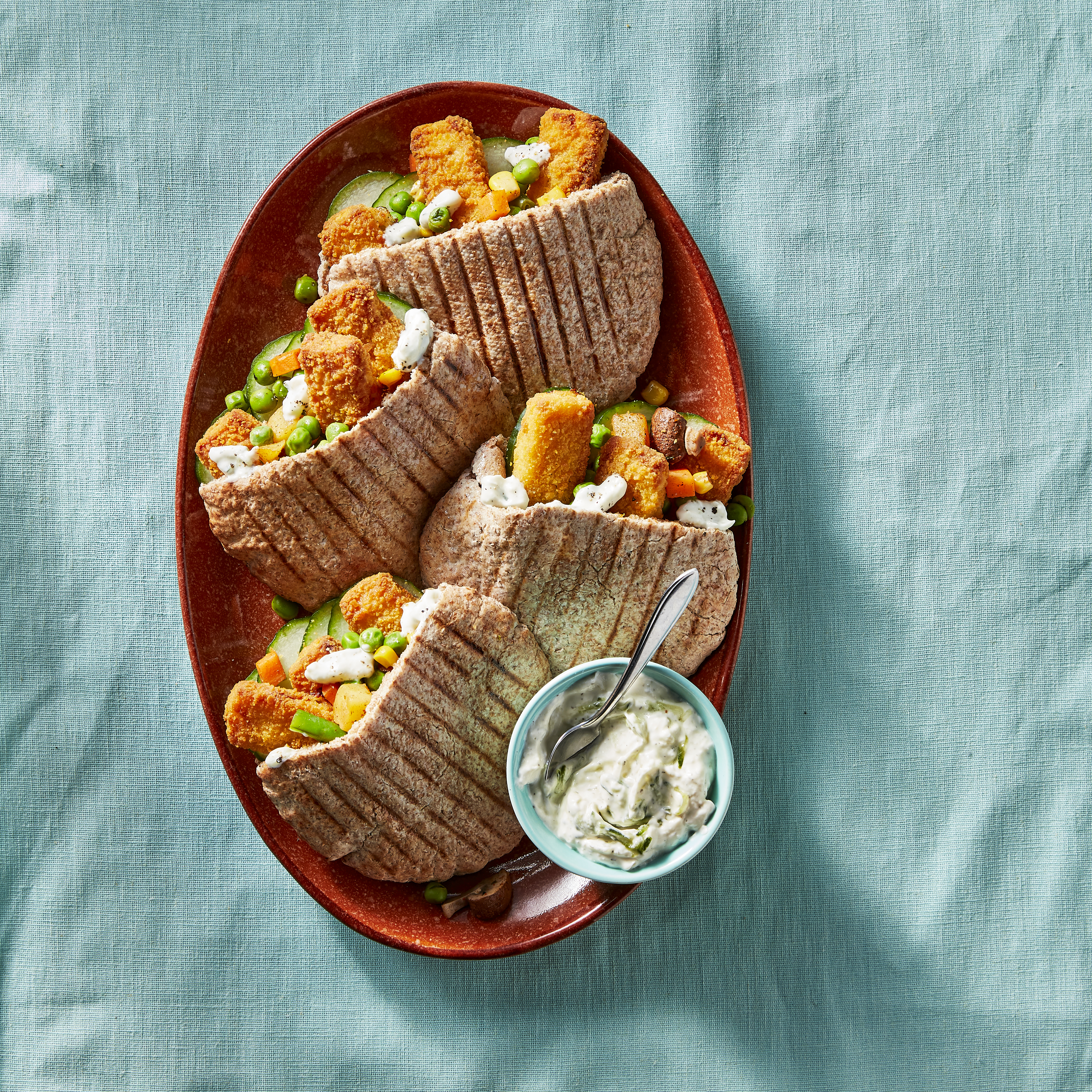 Pitabrood met vissticks en tzatziki