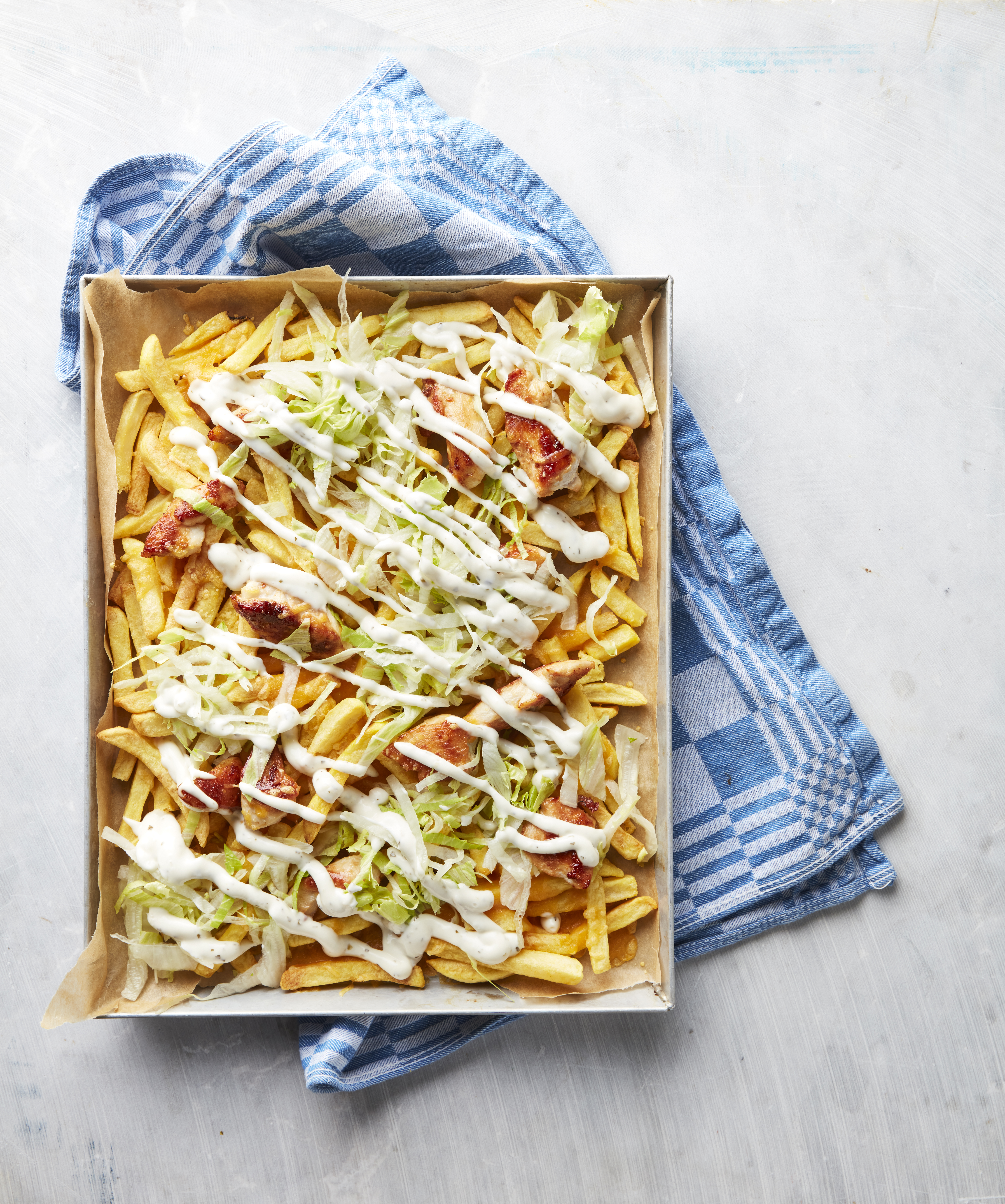 Loaded fries met kip
