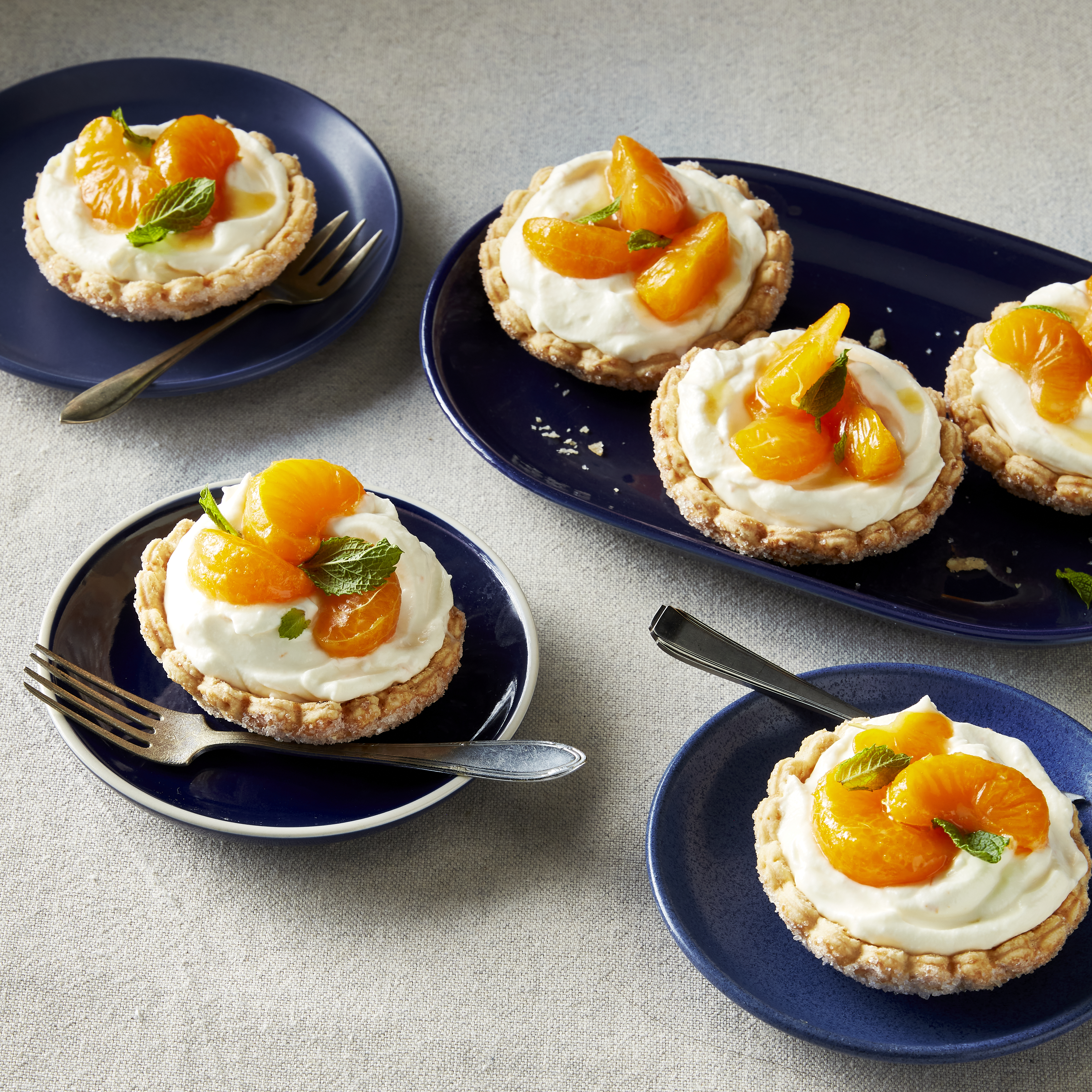 Gevulde suikerschelpen met room en gebakken mandarijn