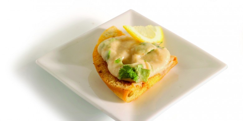 Geroosterde pitapuntjes met hummus