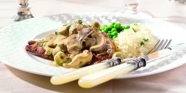 Kalfslapjes met champignons in mosterdsaus