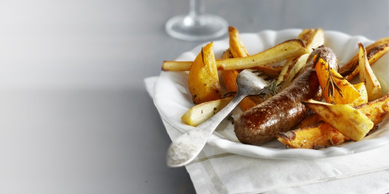 Pompoen en pastinaak met worst van de ovenplaat