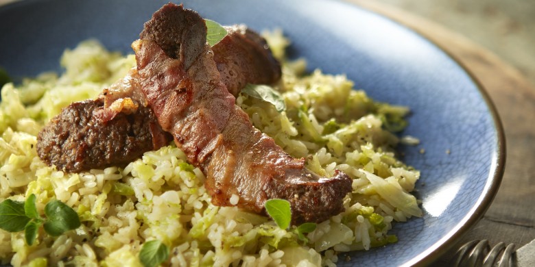 Snelle risotto met groene kool en worstjes
