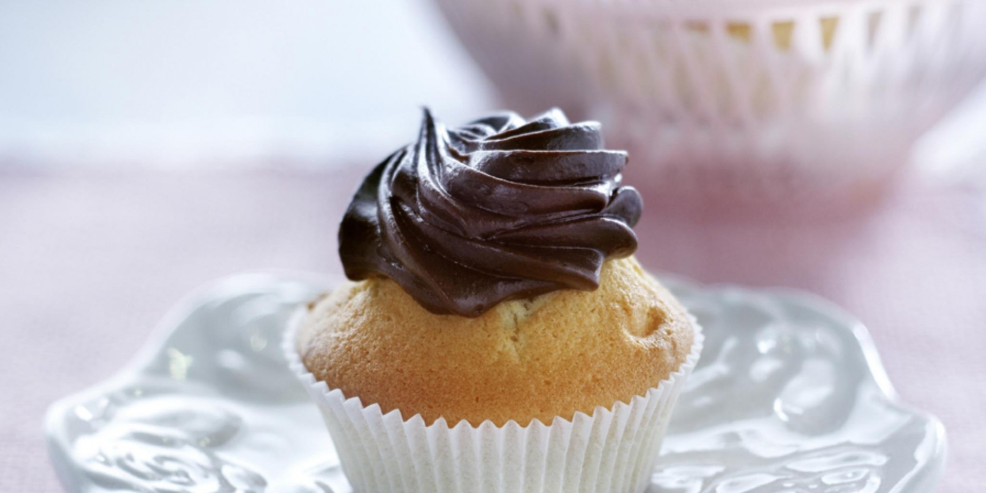 Muffins met een topping van chocoladeroom