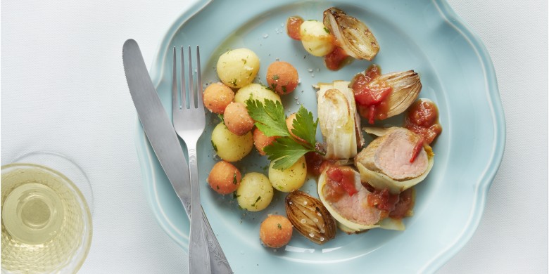 Varkenshaasmedaillons met sinaasappel-tomatensaus