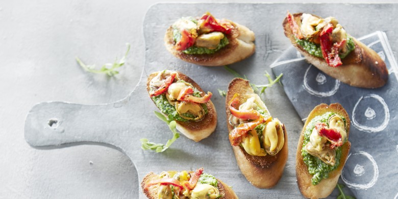 Crostini met mosselen en rucolapesto
