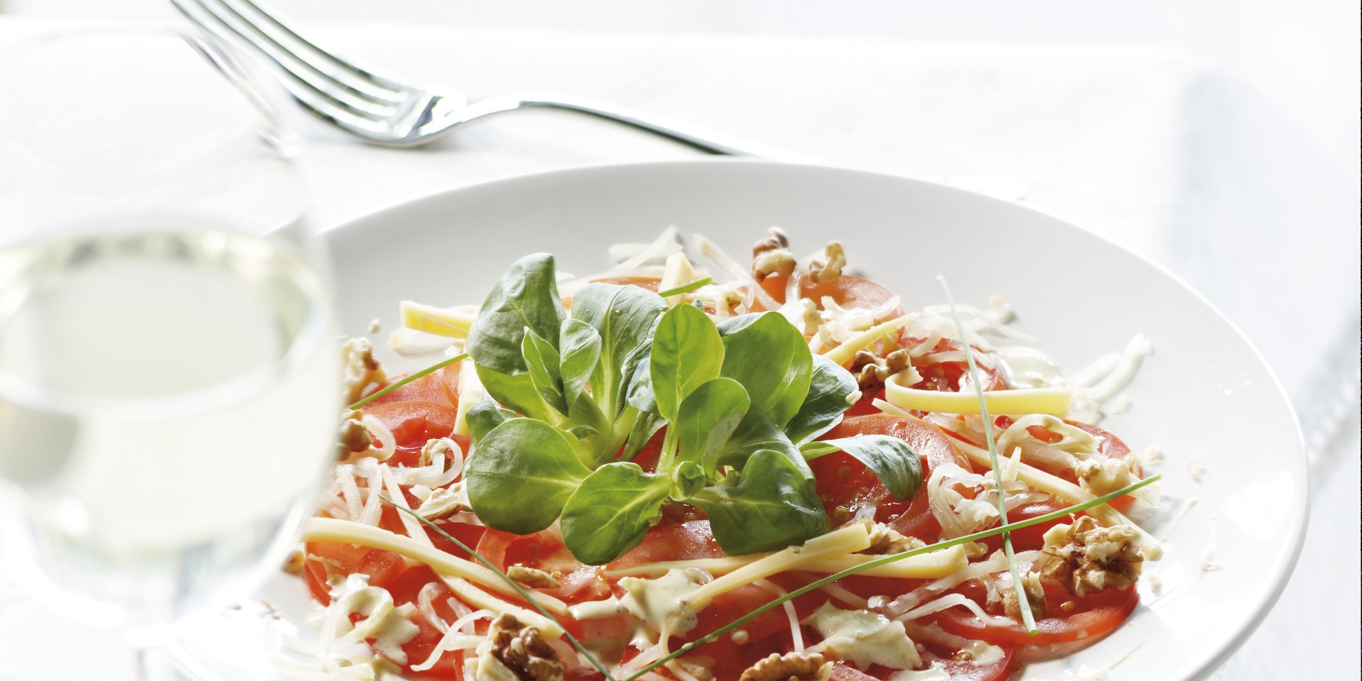 Tomatencarpaccio met selderij en kaas