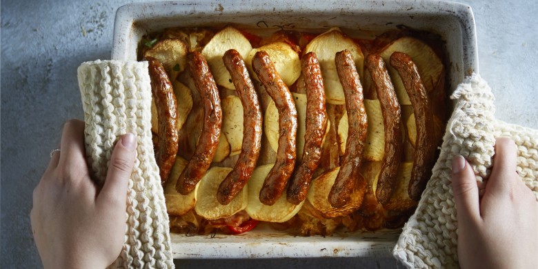 Zuurkoolschotel met paprika, appel en merguezworstjes