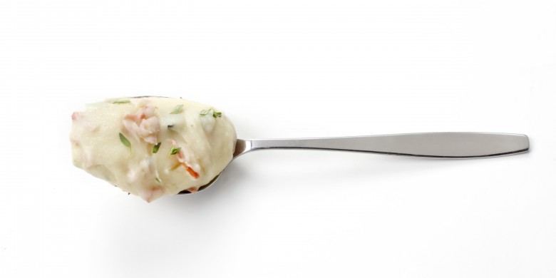 Aardappelpuree met krokante ham en salie