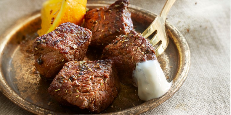 Biefpuntjes met sinaasappel-knoflooksaus